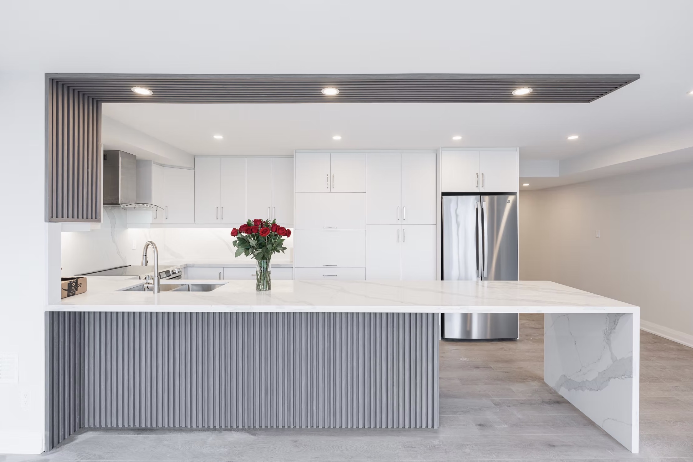 Modern kitchen with white cabinets, marble island, — European window and door project, Vireo Homes GTA