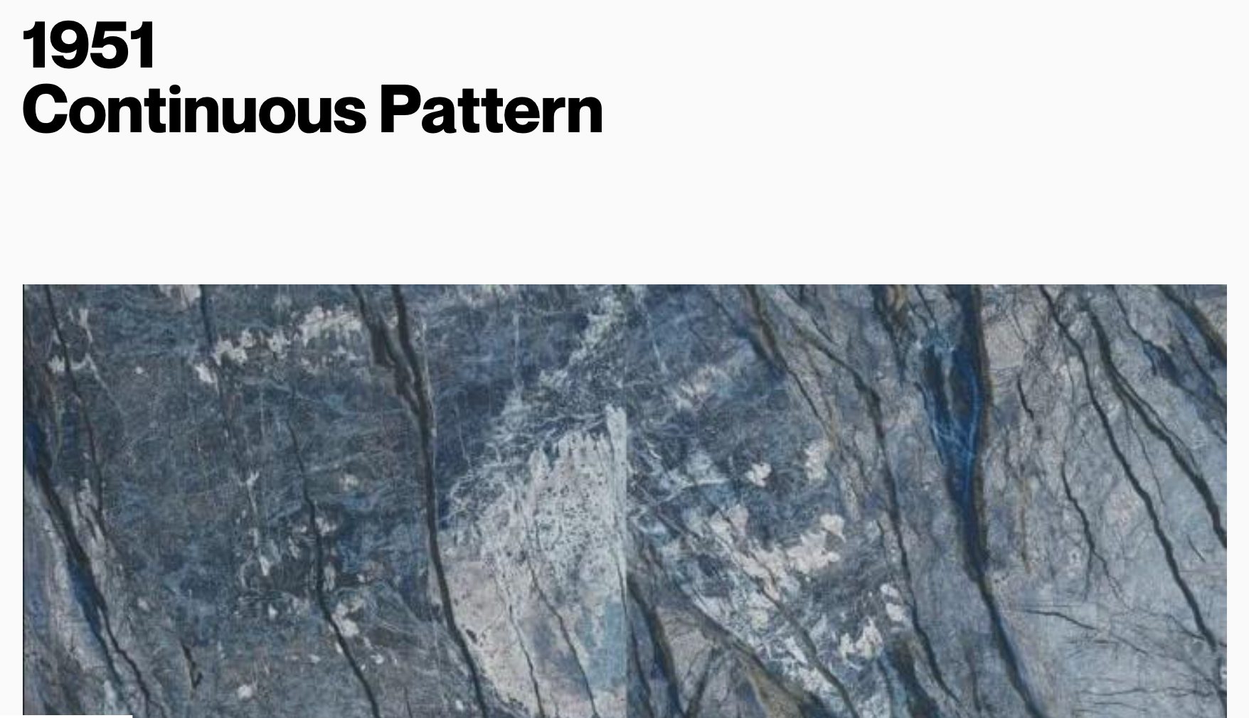Dark blue-grey natural stone continuous pattern with rugged white and — eco wall panel finish, Vireo Homes